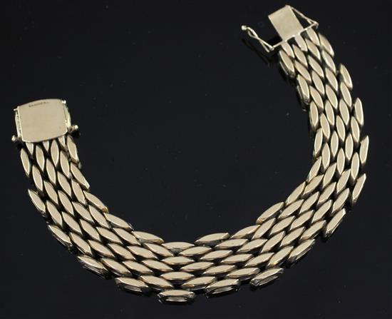 A 1960s heavy 9ct gold brick link bracelet, 7.75in.